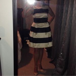 Fitted top with pleated skirt dress